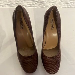 Michael Kors’s shoes . 5’  heel with 1 inch platform. Brown snake Scale skin.